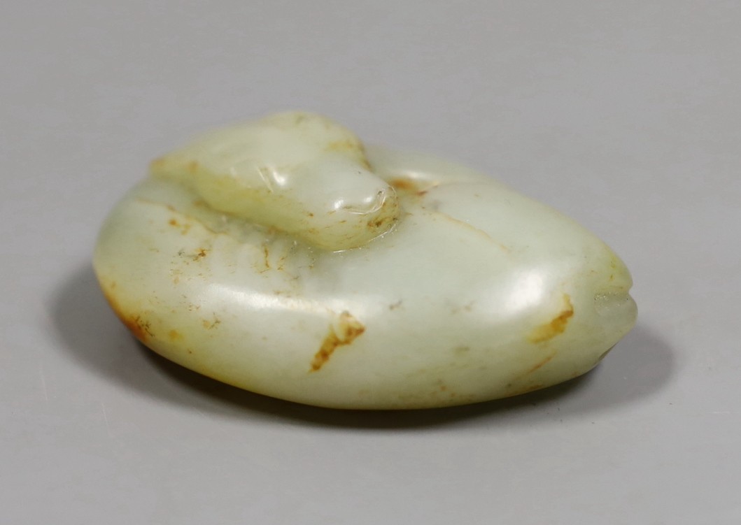 A Chinese jade carving of a sleeping dog, 6cm wide